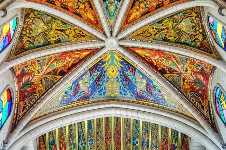 Madrid: Afternoon Royal Palace and Almudena Cathedral Tour - Almudena Cathedral interior: stained glass plus the 19th-century-to-1993 story