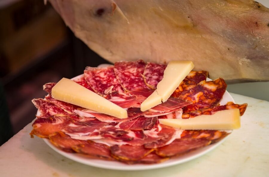 Madrid: Authentic Tapas Evening Tour with a side of History - Starting at Plaza Isabel II: The Square-First Meeting Point