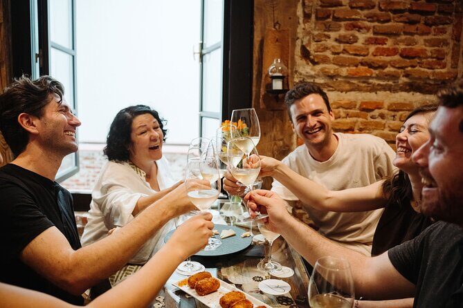 Madrid Evening Tapas and Wine Guided Tour - Stop-by-stop: La Osita, porrón first, then vermouth tostas