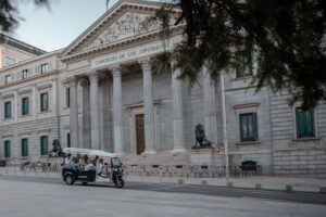 Madrid Expert Plus Tour with Local Guide in Eco Tuk Tuk Private - The ride itself: electric, covered, and made for quick stops