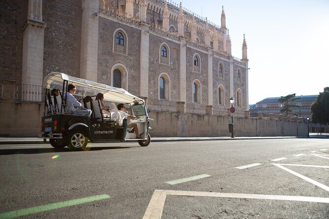 Madrid Expert Plus Tour with Local Guide in Eco Tuk Tuk Private - Stop 1: The covered market area from around 1916
