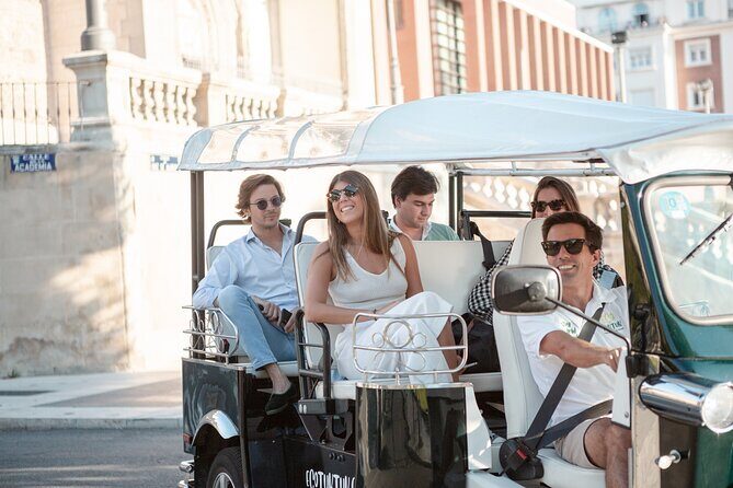 Madrid Expert Tour with Local Guide in Eco Tuk Tuk Private - Atocha Station and the Spanish Courts: architecture you can actually picture