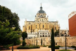 Madrid Highlights and Hidden Gems Private Tour with a Guide - Puerta del Sol: Madrid’s Center of Time, Traffic, and Traditions