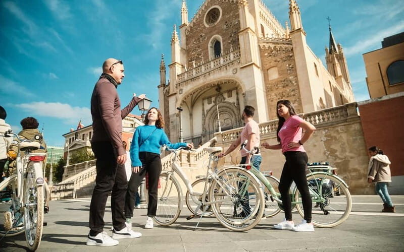 Madrid: Highlights Guided Vintage Bike Tour and Tapas Option - Las Letras Quarter: first ride, quick photos, literary Madrid
