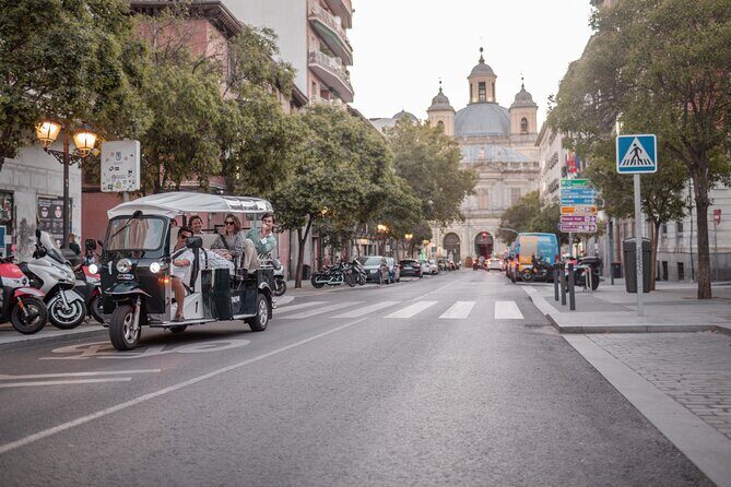 Madrid Historical Tour with Local Guide in Eco Tuk Tuk Private - Almudena Cathedral and Royal Palace gardens: Madrid’s crown jewels, seen efficiently