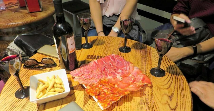Madrid: Iberico Ham and Spanish Wine Small-Group Food Tour - How jamonerías turn taste into a shopping skill