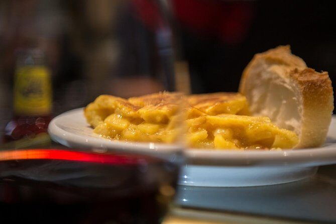 Madrid Local's Wine and Tapas Lunch Tour with a side of History - La Latina on foot: medieval streets with a purpose