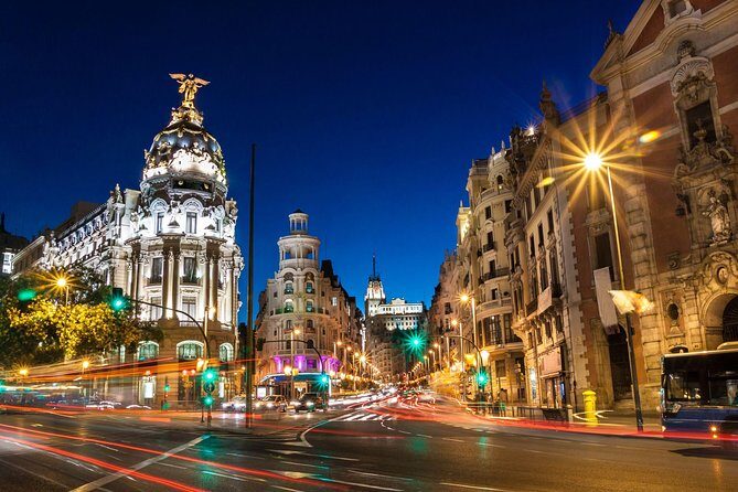 Madrid Sunset Walking Tour with Optional Flamenco Show and Dinner - Royal Palace at night: what you’re really seeing