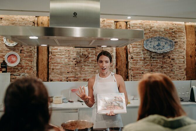 Madrid Tapas & Paella Cooking Experience with Local Market Visit - Small group size: 12 people or fewer, but hands-on varies