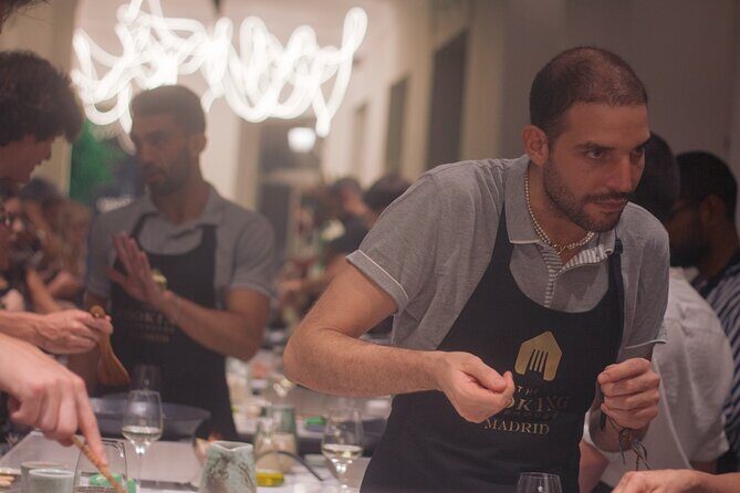 Taste of Spain: Tapas Cooking Class with Bottomless Wine Pairing - Entering The Cooking Clubhouse on Calle de Atocha