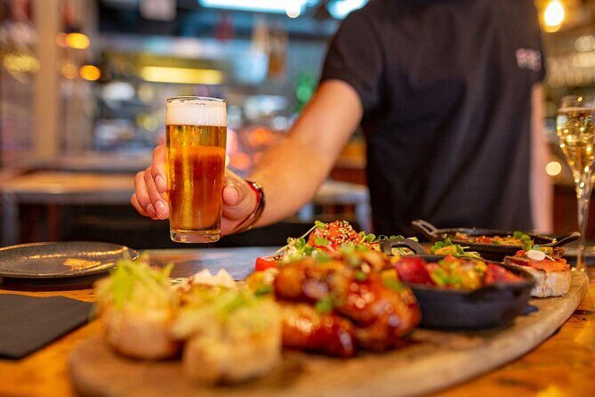 Tasty Tapas & Drinks Tour with a Rooftop Included - Guides, group size, and why the vibe usually works